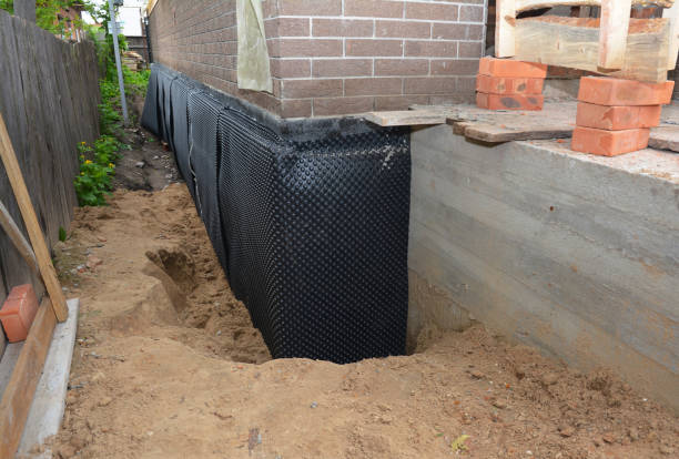 SJ Waterproofing Pros technician performing targeted Foundation Crack Repair assessment in Zanesfield, OH